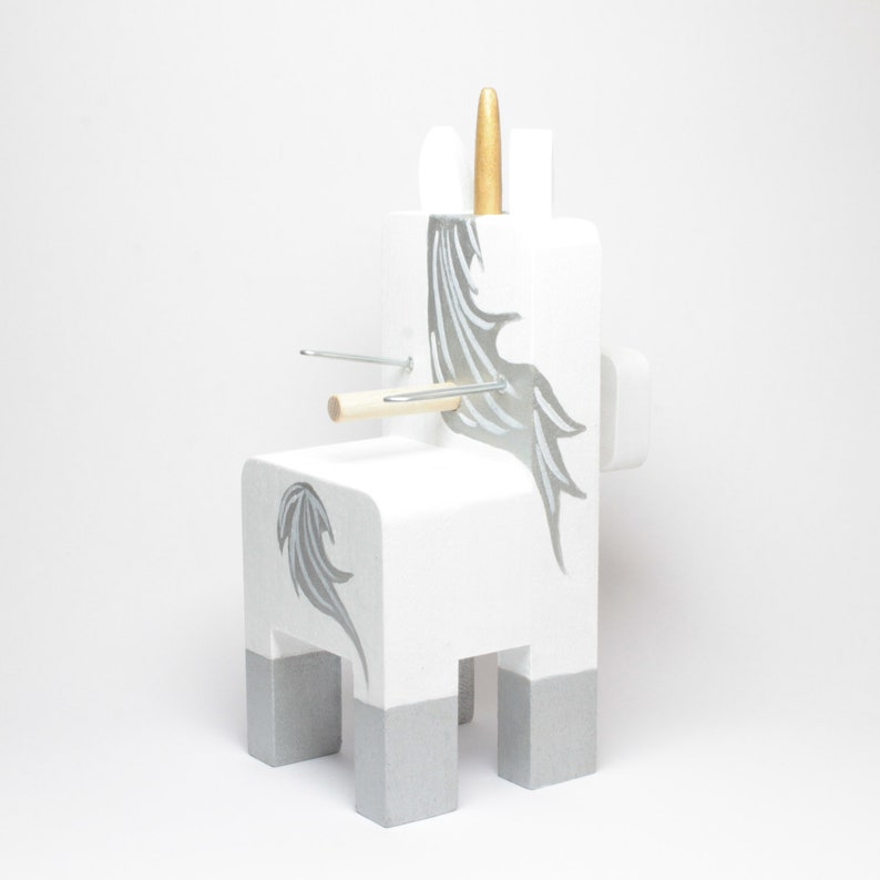 White Unicorn Wearing Eyeglasses Stand.