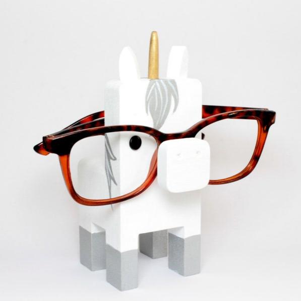 White Unicorn Wearing Eyeglasses Stand.