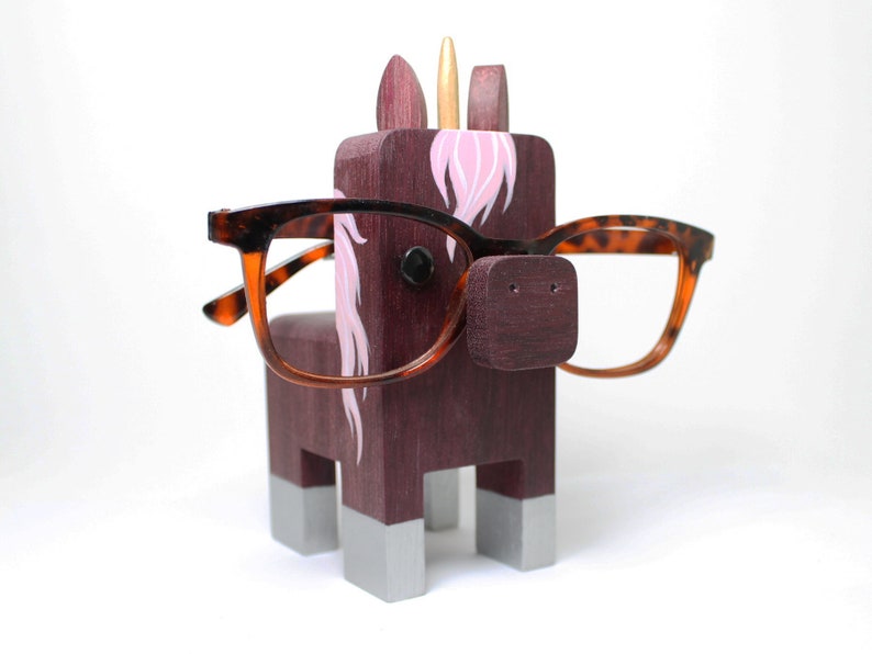 Rod Unicorn Wearing Eyeglasses Stand.